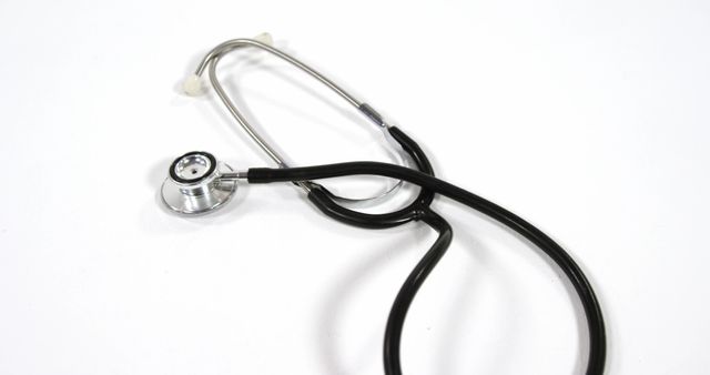 Stethoscope on White Background Symbolizing Health Care and Medicine - Download Free Stock Images Pikwizard.com