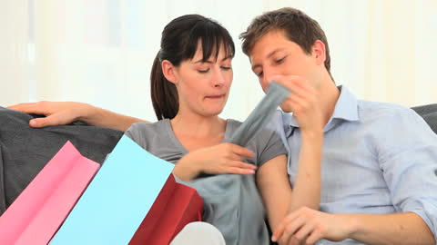 Couple Enjoying Shopping Together at Home
