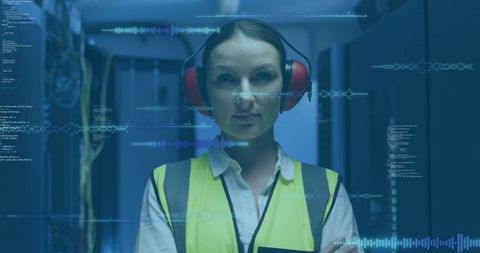 Female Engineer Monitoring Digital Data Center Operations