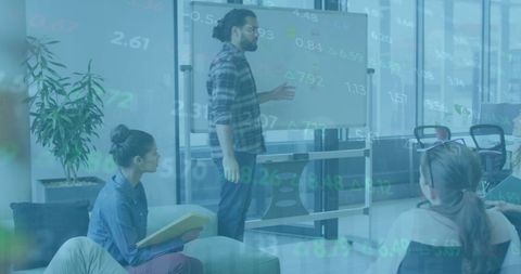 Team Brainstorming with Digital Financial Overlay in Modern Office