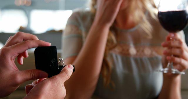 Romantic Proposal with Engagement Ring in Elegant Restaurant Setting - Download Free Stock Images Pikwizard.com