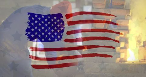 Dual exposure of american flag and factory worker symbolizing patriotism