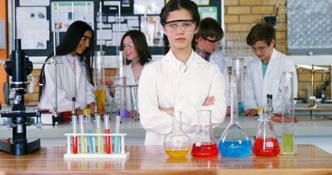 Confident Student in Chemistry Laboratory with Experiments - Download Free Stock Images Pikwizard.com