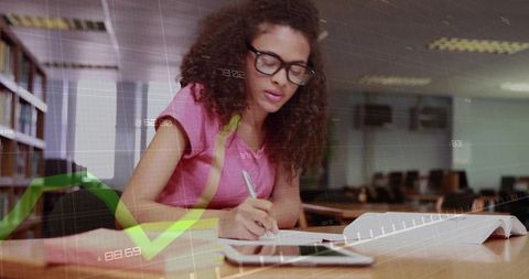 Serious student analyzing data in modern study environment