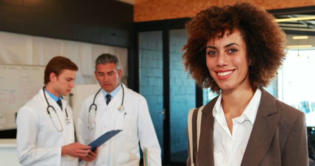 A medical team standing together at hospital reception - Download Free Stock Photos Pikwizard.com