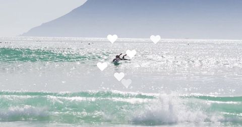 Woman surfing on sparkling ocean water with tree presentation