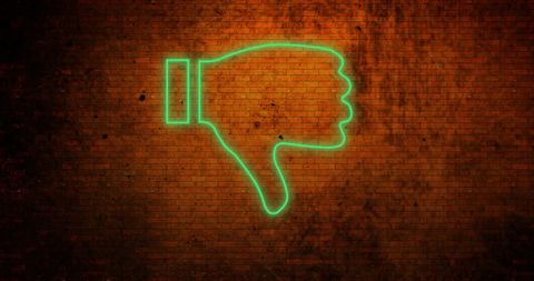 Neon Thumbs Down on Grunge Brick Wall - Download Free Stock Images Pikwizard.com
