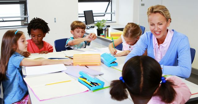 Teacher Engaging with Diverse Classroom of Young Students - Download Free Stock Images Pikwizard.com