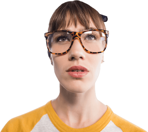Young woman wearing transparent glasses looking upwards