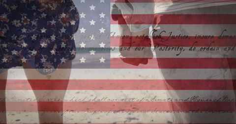 Biracial Couple Holding Hands Overlaid with American Flag and Constitution - Download Free Stock Images Pikwizard.com