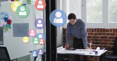 Businessman Networking Through Social Media Interface in Office