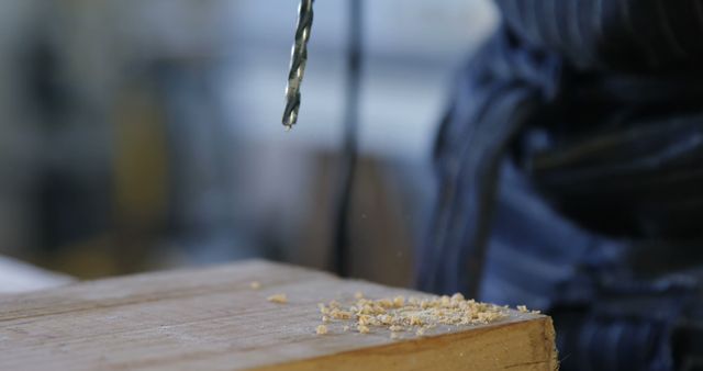 Close-Up of Drill Bit Near Wood in Workshop Setting - Download Free Stock Images Pikwizard.com