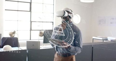 Business Professional Using VR Headset for Holographic Interface