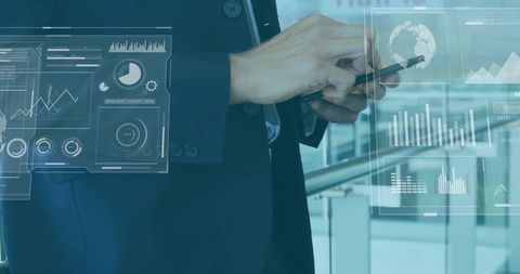 Business executive tapping tablet with holographic data visuals for corporate analytics