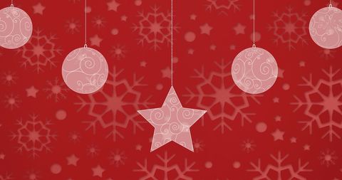 Decorative Christmas Baubles and Star on Festive Red Background