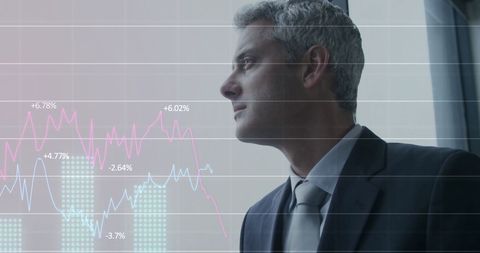 businessman analyzing financial data trends in modern office - Download Free Stock Images Pikwizard.com