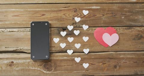 Smartphone and Paper Hearts on Rustic Wooden Surface - Download Free Stock Images Pikwizard.com