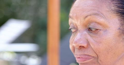 Senior Woman Pensive on Patio