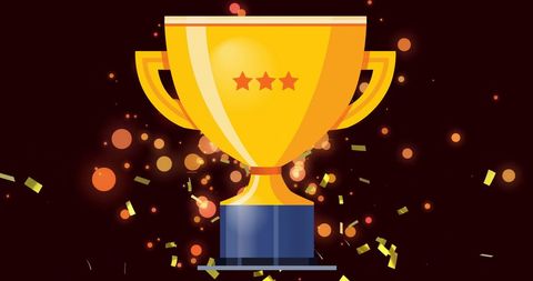 Golden trophy shine with confetti and glowing lights