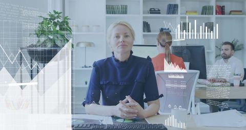 Business Team Analyzing Financial Data with Advanced Technology