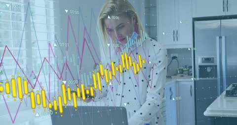 Young Woman Analyzing Financial Data on Laptop at Home