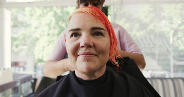 Confident Woman with Red Hair Getting Haircut at Salon - Download Free Stock Images Pikwizard.com