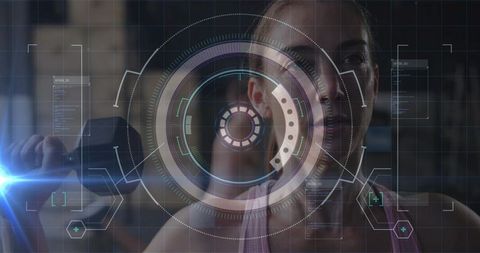 Female athlete lifting dumbbell with augmented reality HUD for futuristic fitness training