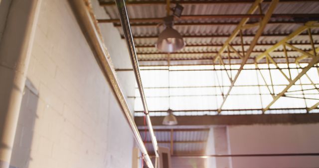 Interior of Industrial Building with Metal Ceiling and Pipes - Download Free Stock Images Pikwizard.com