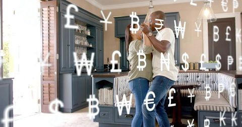 Couple dancing in modern kitchen with floating currency symbols, romance meets finance