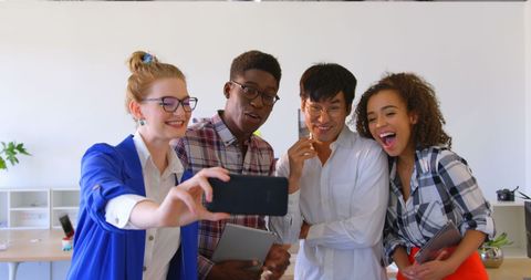Diverse Business Team Taking Selfie in Modern Office