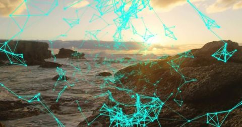 Futuristic Digital Network Overlay on Scenic Rocky Shoreline at Sunset