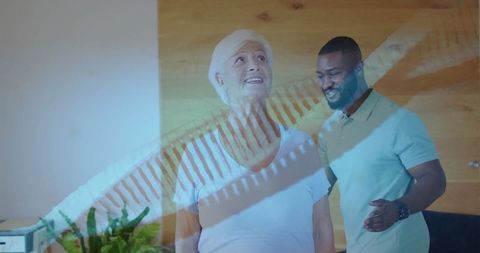 Senior Woman with Caregiver Analyzing Spine Anatomy in Therapy Session