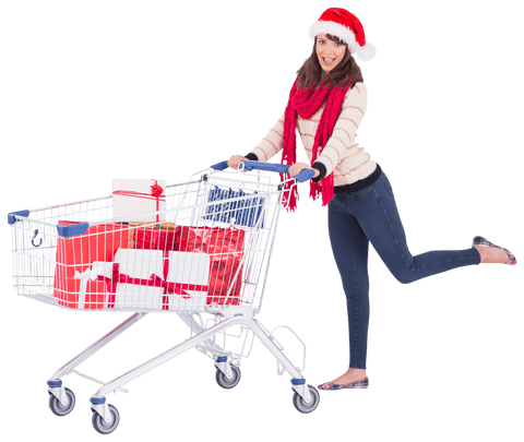 Cheerful woman in santa hat with gift-filled shopping cart transparent