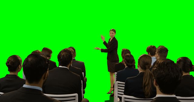 Businesswoman Giving Presentation to Team in Conference Room - Download Free Stock Images Pikwizard.com