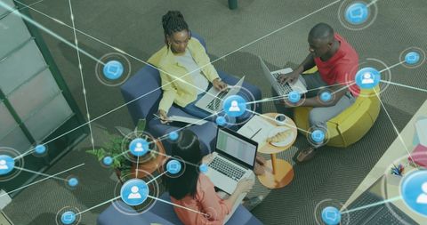 Diverse team collaborating with digital network integration overlay