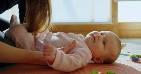 Mother Engaging with Happy Baby During Playtime - Download Free Stock Images Pikwizard.com
