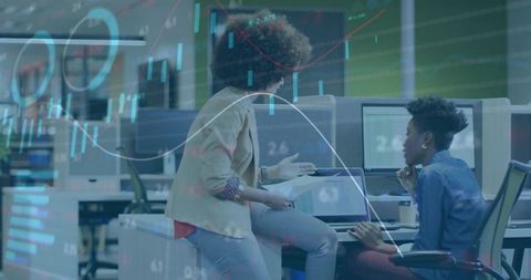 Reviewing financial dashboards and analytics in modern open office collaboration