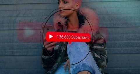 Shows modern influencer culture with visually striking pink hair, embodying digital connectivity. Relevant for themes like social media usage, lifestyle tech branding, content creation dynamics, and personalization in marketing.
