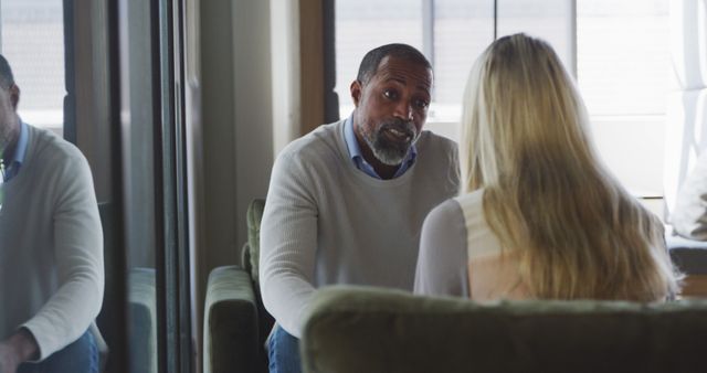 Mature Man Counseling Young Woman in Office Setting - Download Free Stock Images Pikwizard.com