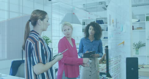 Binary Code Overlay on Business Team in Modern Office