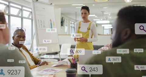 Creative team presenting design concept in workspace brainstorming with data overlays