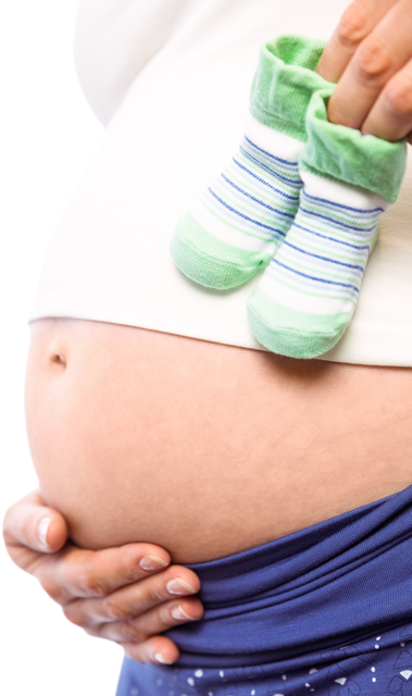 Pregnant Woman Holding Green Baby Shoes Over Bump - Transparent Background - Download Free Stock Videos Pikwizard.com