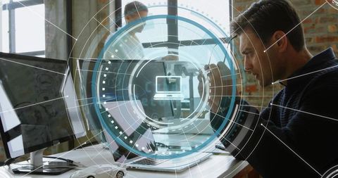 It professional securing laptop with phone while ar hud overlay highlights security icons
