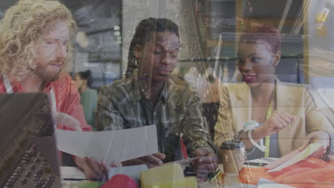 Innovative Data Analysis Team Collaborating at Desk