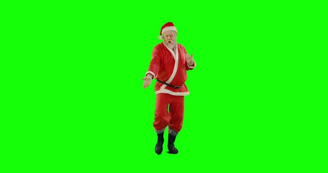 Santa Claus is dancing in a festive mood against a green screen background. Ideal for holiday greetings, Christmas videos, festive advertisements, and social media content aimed at spreading joy and cheer during the holiday season. The green screen allows easy background replacement for versatile usage.