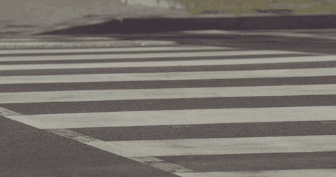 transparent zebra crossing on urban road - Download Free Stock Videos Pikwizard.com