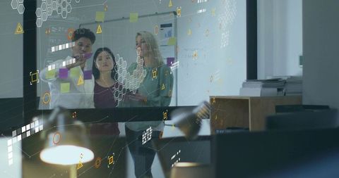 Diverse Professionals Engaged in High-Tech Office Brainstorming