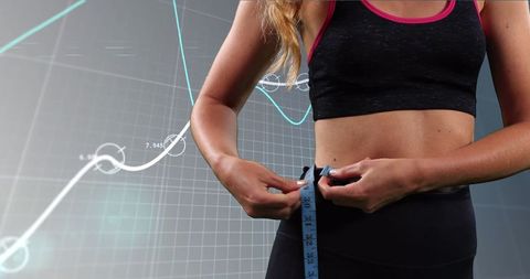 Woman measuring waist amidst health data visuals