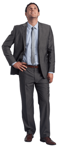 smiling transparent businessman gazing upwards in grey suit - Download Free Stock Videos Pikwizard.com
