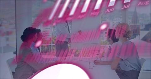 Team Collaborating During Business Presentation with Flip Chart and Magenta Data Overlay